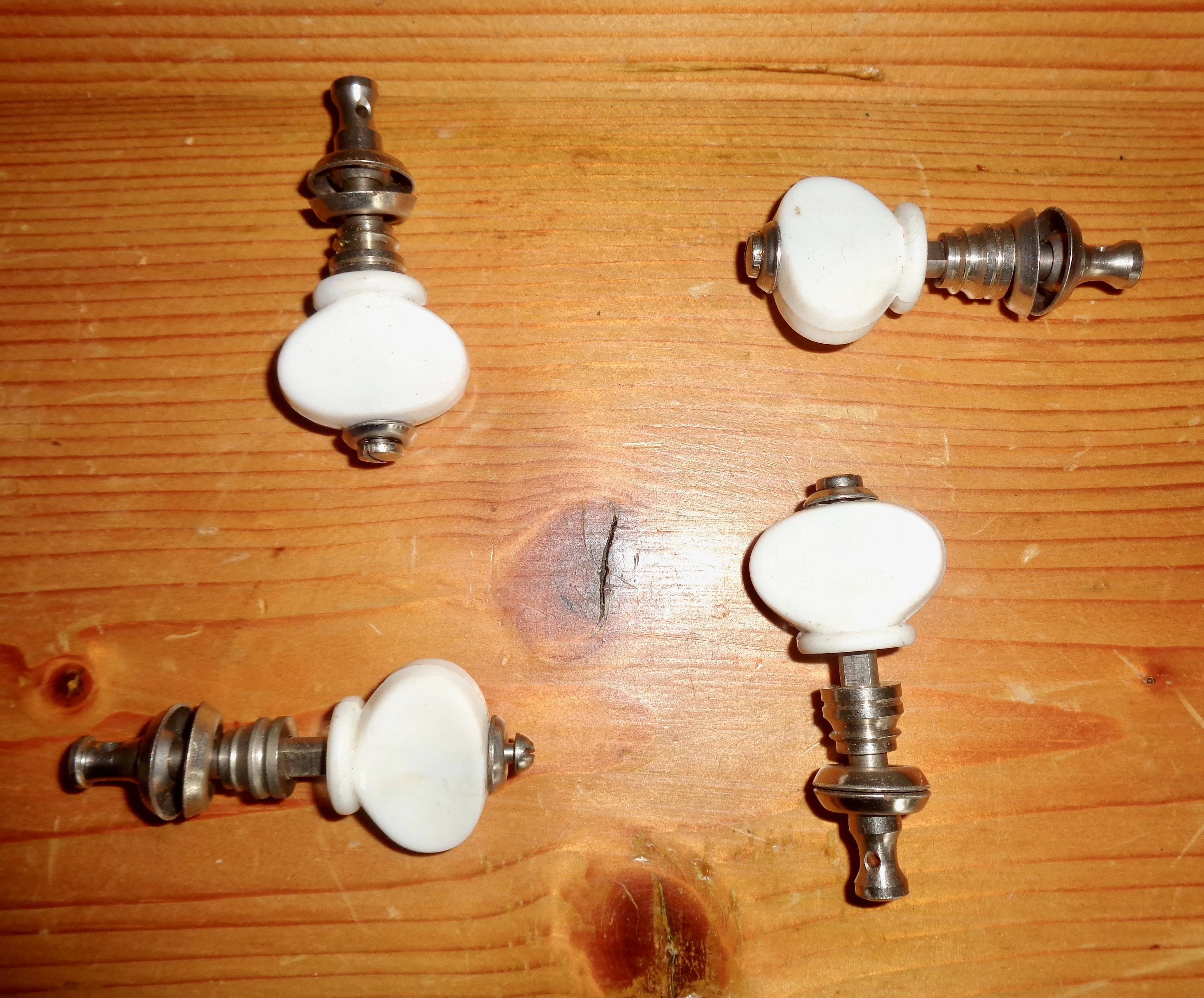 Vintage Set Of Four White Ukulele Tuning Pegs By Norville Group
